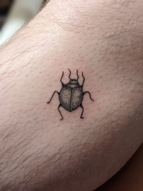 Stick and poke bug tattoo Stick And Poke Nature, House Stick And Poke, Bug Stick N Poke, Leg Tattoos Stick And Poke, Tiny Beetle Tattoo, Cute Beetle Tattoo, Beetle Stick And Poke, Simple Beetle Tattoo, Bug Stick And Poke