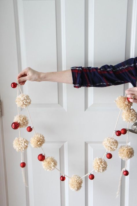 A fast one-hour garland made from yarn pom-poms & mini-ornaments. Use it to decorate a mantel, ledge, or window for less than $10! Garland For Christmas Tree, Diy Pom Pom Garland, Diy Yarn Pom Pom, Garland For Christmas, Fun Winter Crafts, Christmas Pom Pom, Diy Girlande, Diy Christmas Garland, Christmas Yarn