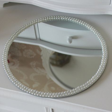 Round Pearl Mirrored Plate  Beautiful wedding centrepiece idea  Ideal as a candle plate or for displaying a centrepiece  Pearl detailing around the edges  Measures: 20.5cms in diameter  http://www.melodymaison.co.uk/product.php?productid=19897=265=1 Mirror Plate Decor Ideas, Mirror Plate Centerpiece Wedding Ideas, Nikah Mirror Plate, Pearl Mirror Diy, Draps Design, Decorated Mirror, Pearl Mirror, Girls Room Diy, Mirror Decor Ideas