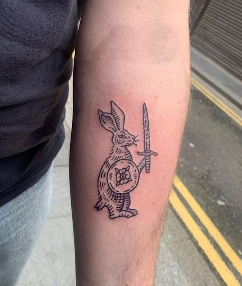 Medieval Marginalia Tattoo, Tiny Castle Tattoo, Medieval Rabbit Tattoo, Ren Faire Tattoo, Mideaval Tattoo Design, Irish Wolf Tattoo, Medieval Animal Tattoo, Medieval Wolf Tattoo, American Traditional Medieval Tattoo