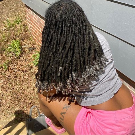 After Cutting my hair , I have been enjoying different styles with my Locs . Here’s my most recent picture showing the length after 1 year post hair cut Locs Down Hairstyles, Locs And Beads, Cute Loc Hairstyles, Locs With Beads, Loc Hairstyles For Women, Female Dreadlocks Styles, Long Loc Styles, Dreads Styles For Women, Long Locs