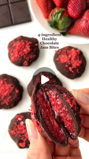 Selma | easy healthy recipes on Instagram: "4-ingredient Healthy Chocolate Jam Bites😍 These are such a yummy dessert idea😋
•
More healthy recipes in my Ebook which has 100 easy recipes, link in my profile🥰
•
This recipe makes 6-8 bites
•
Ingredients:
1/2 cup raspberries (120 ml / 65g)
1/2 cup strawberries (120 ml / 85g)
1 1/2 tablespoons chia seeds
•
toppings:
100 g / 3.5 oz. 80% dark chocolate, melted
optional: 1 teaspoon coconut oil
optional: freeze-dried strawberries
•
1. Mash the berries
2. Add the chia seeds and stir to combine
3. Let sit for 20 minutes to let the chia seeds soak and mixture to thicken
4. Spoon dollops onto a plate lined with parchment paper
5. Let set in the freezer for about 1-2 hours or until set
6. Melt the chocolate (with the coconut oil). Dip the bites in the