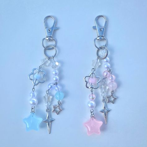 All items are handmade by me! ☆ Starflower keychain adds a pop of color to your items! Made with: Faux pearls, flower charms, blue/pink star charms, stainless steel wire Cute Blue Jewelry With Charms, Cute Pink Charms For Jewelry Making, Pink Keychains, Silly Jewelry, Handmade Pink Adjustable Charms, Brand Planning, Kawaii Beaded Keychain, Jellyfish Keychain Beads, Keychain Charms