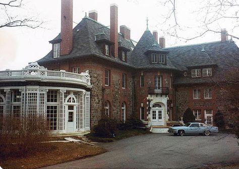 "Petrick mansion"  This Chateauesque mansion was built in Tuxedo Park, New York by architect Whitney Warren for the French-American banker Henry Whitney Munroe in the late 1890's. Originally called Crow's Nest, it became Lindley Hall when purchased by the Lindley family in 1926. It is filled with French influences, particularly Art Nouveau railings and carvings and carved walnut panelling. From: Big Old Houses: As Good As It Gets | New York Social Diary Tuxedo Park New York, 60s Mansion, 1960s Mansion, 1890s House, Mansion New York, New York Mansion, 60s House, Nyc House, House Nyc