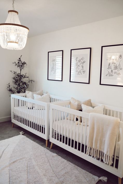 gender neutral, white, minimal baby nursery for twins with subtle disney decor Twin Neutral Nursery Ideas, White Gender Neutral Nursery, Neutral Twin Nursery Ideas, Nursery For Twins Gender Neutral, Nursery Ideas Ikea Dresser, Nursery With Two Cribs, Disney Twin Nursery, Minimal Disney Nursery, Twins Nursery Room Gender Neutral