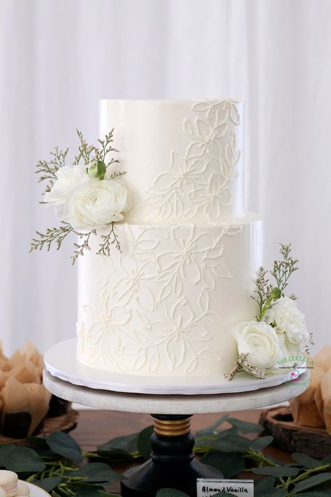 Buttercream Wedding Cakes – Dulcerella | Boise Wedding Cakes White Piping Wedding Cake, Elegant Buttercream Wedding Cake, Wedding Cakes Textured, Embossed Wedding Cake, Wedding Cake With Frosting Flowers, Wedding Two Tier Cake, Butter Cream Wedding Cakes, Wedding Cake Inspo Simple, Buttercream Flower Wedding Cake