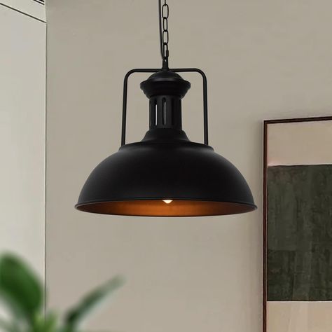 Vintage 1-light Black Pendant by HUOKU embodies industrial charm with its matte black finish and high-quality wrought iron construction. The dome shade design, reminiscent of old-fashioned miner lamps, adds a nostalgic touch to any space. This pendant light is perfect for enhancing kitchen islands, dining tables, and living rooms with its rustic appeal. Its adjustable hanging length ensures versatility in installation, providing focused task lighting or ambient illumination as needed. Ideal for farmhouse-style interiors, this fixture from HUOKU seamlessly combines durability, style, and functionality, making it a standout choice for both residential and commercial settings. HUOKU Mateo Matte Black Industrial Dome Led Medium Hanging Pendant Light | PD1007731 Industrial Lights, Shade Design, Hanging Pendant Light, Black Industrial, Industrial Pendant, Kitchen Islands, Task Lighting, Black Pendant, Hanging Pendant