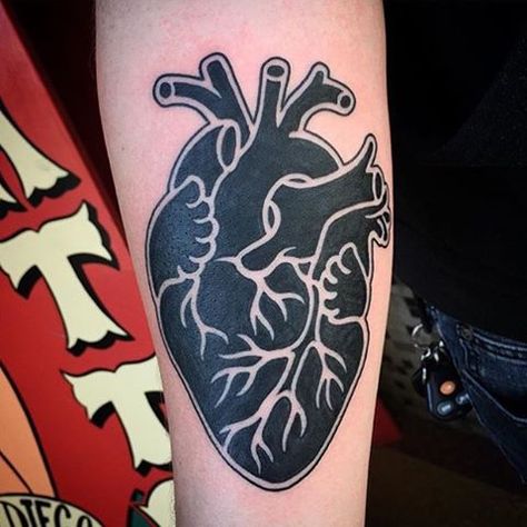 Black and white anatomical style heart tattoo on the inner side of the right arm Heart Tattoo Unique, Black And White Heart Tattoo, White Heart Tattoo, White Heart Tattoos, Traditional Heart Tattoos, Black Heart Tattoos, Anatomical Heart Tattoo, Tattoo Unique, Heart Tattoos