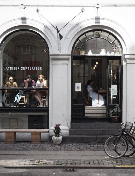 Atelier September, Copenhagen Copenhagen Cafe, Atelier September, September Art, Copenhagen Travel, Art Cafe, Round Tower, Cafe Shop Design, Colourful Buildings, Taffy