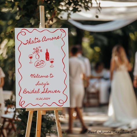 That's Amore! Bridal Shower Welcome Sign ~ Canva Template A romantic and charming celebration inspired by the elegance and passion of Italy - That's Amore themed bridal shower welcome sign. This theme encapsulates the essence of Italian romance, providing a beautiful and intimate setting for celebrating the bride-to-be. It's all about love, laughter, and la dolce vita, making it a truly memorable and special occasion. Please read before purchase: This is a fully editable, do-it-yourself Canva Te Italian Dolce Vita, Italian Romance, Bridal Shower Welcome Sign, Shower Welcome Sign, Create Invitations, Whimsical Illustration, Bridal Shower Theme, Diy Invitations, Sign Templates