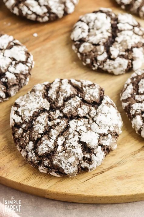 Chocolate Cool Whip Cookies • The Simple Parent Chocolate Cool Whip, Chocolate Crackle Cookies, Cracked Cookies, Cool Whip Cookies, Cool Whip Desserts, Chocolate Puff, Crackle Cookies, Chocolate Crackles, 3 Ingredient Cookies