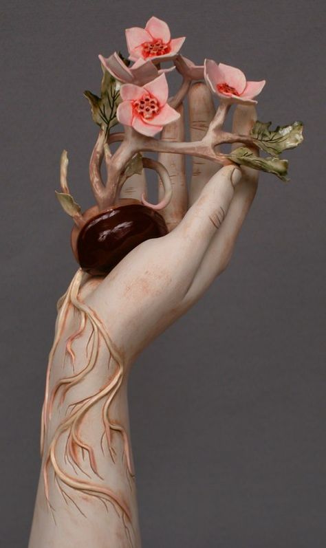 Unknown. Flower growing out of a heart Sculptures Céramiques, Sculpture Projects, Hand Sculpture, Ceramics Projects, Hand Art, Clay Sculpture, Art Plastique, Ceramic Sculpture, Clay Art