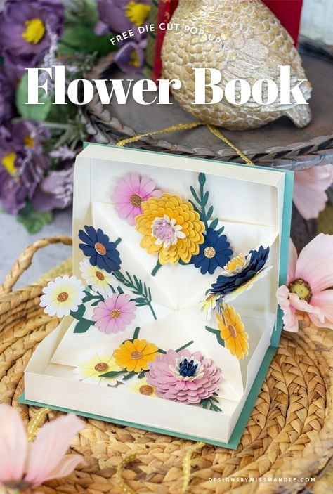 FREE Pop-Up Flower Book - Designs By Miss Mandee. 3D, book, card, Cricut, die cut, floral, flower, flowers, free, free cut file, freebie, gift, paper art, paper flower, paper flowers, papercraft, pop-up, pop-up card, pop-up flower book, reader, reading, rolled flowers, silhouette, svg. Paper Flower Pop Up Card, Free Svg Pop Up Card, Pop Up Paper Flowers, Cricut 3d Cards Pop Up, Pop Up Cricut Card, Cricut Popup Cards Svg, Printable Pop Up Cards Templates, Free Pop Up Card Svg Files, 3d Flower Cards