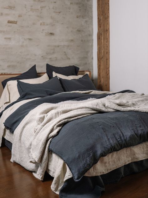 Dark Grey and Sand color linen Bedding Set accented with linen waffle blanket. Blue Gray Bedding Ideas, All Gray Bed, Dark Grey Bedspread, Charcoal Bedding Layered, Mens Dark Bedding, Dark Grey Linen Bedding, Bedding Ideas For Grey Walls, Moody Blue Bedding, Dark Bedding Sets