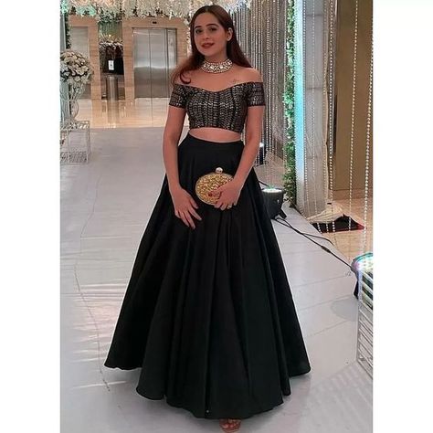 Get ready to dazzle in Odette's stunning, semi-stitched designer lehenga choli and dupatta set, featuring intricate sequin embellishments on a faux georgette fabric, with an unstitched blouse suitable for up to size 42. Complete the look with coordinated accessories, high heels, and a radiant smile! ✨💃👑 Blouse For Lehenga Crop Tops, Black Lehenga Party Wear Indian Weddings, Black Crop Top Lehenga, Crop Top Designs For Lehenga, Black Lehenga Party Wear, Crop Top Lehenga Wedding, Crop Top Lehenga Designs, Party Wear Crop Top, Off Shoulder Lehenga