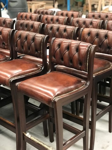 Regency bar stools in Hand-Coloured Brown leather, dark oak wood stain and individual brass studs. #fleminghowland #barstool #leatherchairs Bar Sofas Lounge, Speakeasy Bar Stools, Dark Wood Bar Stools, Leather Bar Stools With Back, Bar Stools Ideas, Bar Chair Design, Rustic Bar Stool, Leather Bar Chairs, Bar Stools Leather