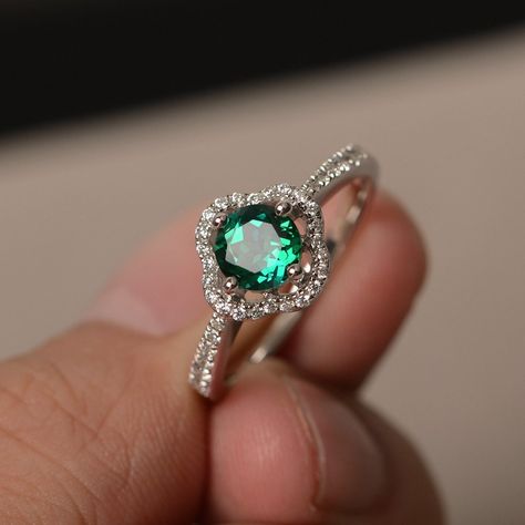 This is a gorgeous handmade creation. Its beauty is its simplicity & Elegance.  The 6*6mm round cut lab created emerald is crafted in solid sterling silver and with rhodium plated. All item is sent in a beautiful gift box You can realize more lovely stuff clicking the link https://www.etsy.com/shop/knightjewelry?refshopsection_shophome_leftnav Please leave the correct address and you phone number for delivering successfully. Antique Emerald Ring, Emerald Engagement Ring Green, Silver Emerald Ring, Swiss Blue Topaz Ring, Green Gemstone Ring, Emerald Wedding Rings, Emerald Rings, Green Amethyst Ring, Purple Rings