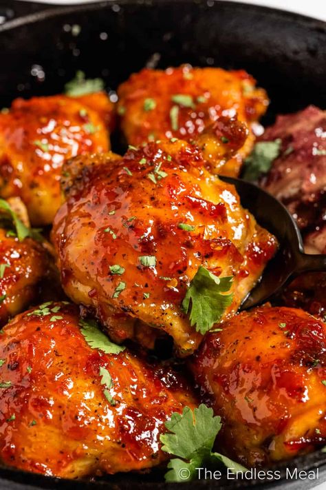 This harissa honey chicken is the most delicious honey glazed chicken ever. The sweet and sticky sauce is spiced with harissa, a North African paste that is super flavourful. You'll be licking the glaze off your fingers! #theendlessmeal #chicken #harissa #harissachicken #chickendinner #weeknightdinner #easyweeknightdinner #quickdinner #chickenthighs #healthydinner #easymeals Chicken With Harissa Sauce, Harrisa Chicken Recipes, Asian Menu Ideas, Harissa Chicken Recipes, Recipes With Harissa, African Chicken Recipes, Chicken Harissa, Honey Harissa Chicken, Harissa Honey Chicken