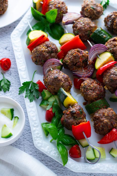 Mediterranean Beef Meatball Skewers Mediterranean Beef, Meatball Skewers, Meat Loaves, Easy Summer Dinner, Kebab Skewers, Homemade Tzatziki Sauce, Fresh Bread Crumbs, Bulgur Salad, How To Make Meatballs