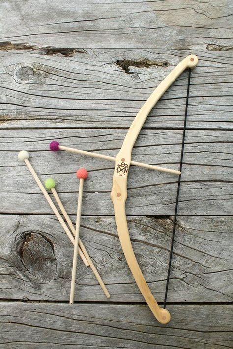 Handmade wooden toys crafted by Needle & Nail Wooden Bow And Arrow, Nail Unique, Toy Bow And Arrow, Kids Bow And Arrow, Bow And Arrow Set, Wood Games, Bow Arrow, Handmade Wooden Toys, Wooden Bow