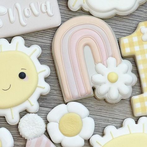 Heavenly K Cookie Co on Instagram: "One in the Sun ☀️!!!….Happy Birthday sweet Nova!!…☀️🌼 #suncookies #oneinthesun #decoratedcookies #sugarcookies #instagramcookies #customcookies #firstbirthdaycookies #edibleart #bakewithlove #occookies #irvinecookies #socalmoms #laderaranchmoms #ranchosantamargarita #northtustin #irvinemoms #lagunabeachmoms #laderaranchmoms #lakeforestmoms #foothillranch #rainbowcookies #birthdaygirl #birthdaycookies" One Lap Around The Sun 1st Birthday, First Lap Around The Sun Birthday, Ray Of Sunshine Cookies, You Are My Sunshine Cookies, Sun Birthday Cookies, Sunshine 1st Birthday Cookies, Sunshine And Rainbow Cookies, First Birthday Cookies, Rainbow Cookies