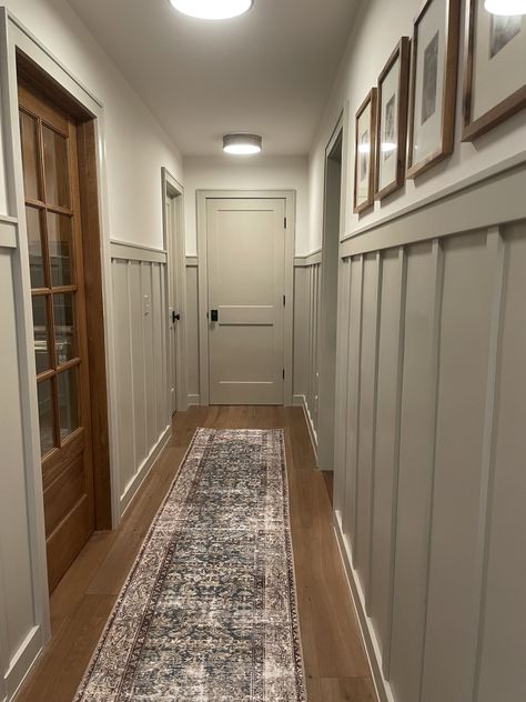 Wood And White Hallway, Craftsman Hallway Ideas, Hallway Decorating Ideas Wall, Narrow Hallway With Doors, Old Farmhouse Hallway, Entryway To Basement Stairs, Framing Hallway Entrance, High Traffic Hallway Wall Ideas, Galley Hallway Ideas