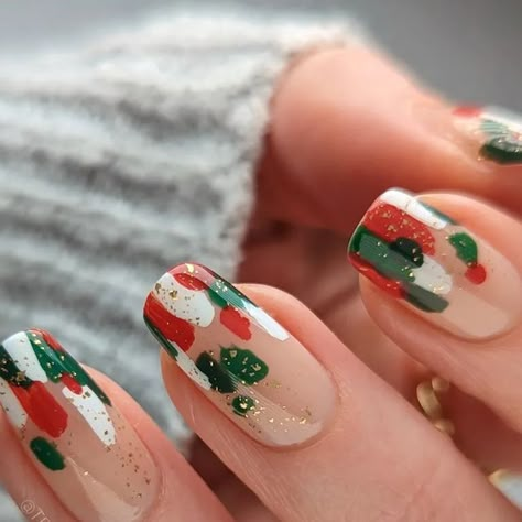 Tessa | DIY Nail Art on Instagram: "Holiday Abstract ❤️✨💚 I love how this design can easily be modified to fit any season. Have you tried this one yet? • • • Polish: @orly Rose-Colored Glasses, Regal Pine, Forever and Evergreen, Velvet Ribbon @kbshimmer White Here White Now @ilnp Karma, Glass Candy Top Coat • • #nails #nailart #abstractnails #christmasnails #holidaynails Abstract Christmas nails, easy nail art, diy manicure, holiday mani" Striped Christmas Nails, Christmas Colour Nails, Christmas Glass Nails, Christmas Nails Abstract, Christmas Abstract Nails, Christmas Season Nails, Abstract Christmas Nails, Retro Christmas Nails, Easy Nail Art Diy