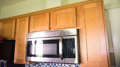 Many times an over-the-range microwave that recirculates cooking fumes can be converted to exhaust to the outside. Here's how to go about it. Over Range Microwave, Otr Microwave, Stove Vent, Vent Duct, Range Vent, Kitchen Vent, Kitchen Exhaust, Build A Frame, Exhaust Vent