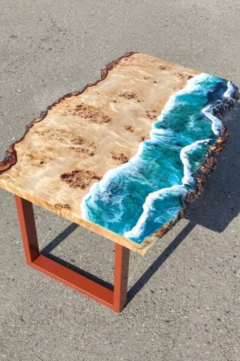 Оcean epoxy resin tables will fancy those who constantly miss the fresh ocean breeze when forever stuck behind the desk! Liven up those endless homeworking hours with this lovely epoxy table beautifully adorned with beach imagery. Being a perfect combination of natural wood and turquoise epoxy resin, these living room tables will always remind of celestial blue and white foamy waves crashing the golden shore every time you take a sip of coffee or have a home lunch break! Epoxy Decor, Epoxy Resin Furniture, Dine Table, Resin Tables, Resin Decor, Table Epoxy, Celestial Blue, Slab Table, Epoxy Table