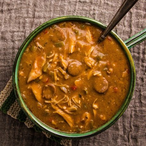 Chris Shepherd, executive chef and owner of Underbelly in Houston, Texas, shared this recipe exclusively with Epicurious. This Cajun and Creole classic is often served with rice, but Shepherd insists his version doesn't need the starchy side. Studded with turkey meat and andouille sausage, it's filling enough on its own. Making a solid roux is essential to gumbo, because the flour and fat mixture thickens and flavors the dish. For newbies, Shepherd recommends patience. Roux must be cooked ... Turkey Gumbo Recipe, Turkey Gumbo, Thanksgiving Turkey Leftovers, Leftover Turkey Recipes, Turkey Chicken, Gumbo Recipe, Andouille Sausage, Leftover Turkey, Andouille