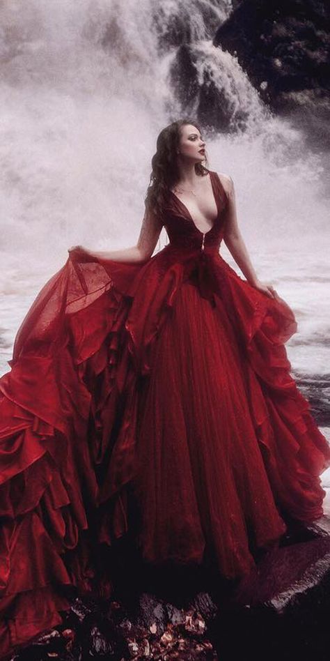 Dark Romance: 18 Gothic Wedding Dresses ★ See more: https://weddingdressesguide.com/gothic-wedding-dresses/ #bridalgown #weddingdress Red Wedding Dress Aesthetic, Red Woman Aesthetic, Malyarova Olga, Princess Dress Red, Gothic Wedding Dresses, Red Dress Aesthetic, Fire Dress, Woman In Red Dress, Couture Dior