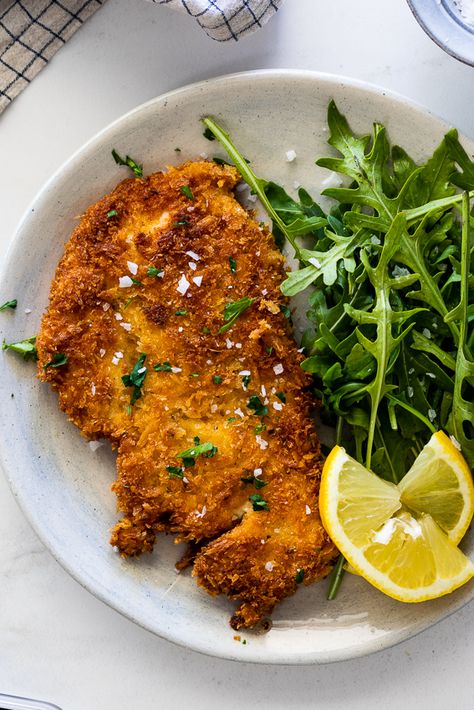 Crispy chicken schnitzel is easy to make and delicious. Panko-crusted and fried until golden, it is the perfect family dinner recipe. #dinnerideas #easychickenrecipe Mini Spanakopita, Lunch Ideas With Chicken, Crispy Chicken Schnitzel, Avocado Bruschetta, Pork Souvlaki, Greek Pork, Cranberry Sangria, Lemon Risotto, Tuscan Salmon