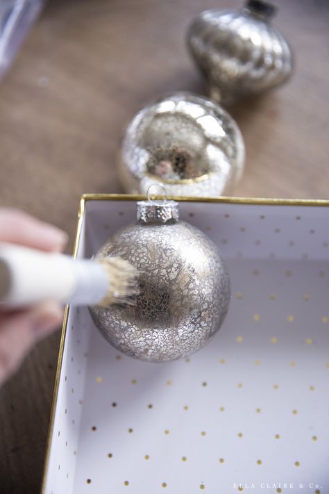 Elevate your inexpensive Christmas Ornaments with these DIY Tips and tricks! It is easy to upgrade cheap ornaments and make them look more high end with these ideas. Diy Cheap Ornaments Ideas, How To Make Ornaments Diy, How To Decorate Christmas Ornament Balls, Unbreakable Ornaments Diy, Diy Silver Ornaments, White Christmas Bulbs, Metallic Ornaments Diy, Update Christmas Ornaments, How To Age Christmas Ornaments