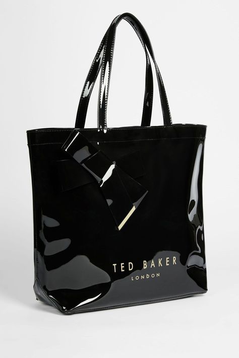 Take the icon bag for each spin with our new and improved NICON. The knot bow detail icon bag promises more than just something to hold your vital ingredients in; with our signature Ted Baker branding and knot bow detail, this sweet bag will be the one you reach for time after time.  100% Other fibres. Ted Baker Black Bag, Ted Baker Handbag, Ted Baker Bag, Knot Bow, Sweet Bags, Time After Time, New And Improved, Black Shoulder Bag, Ted Baker London