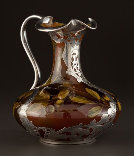 AN AMERICAN SILVER MOUNTED ART POTTERY PITCHER   Rookwood Pottery, Cincinnati, Ohio, circa 1892   Decorated by Matthew Andrew Daly (American 1860-1937) Gorham Silver, Rookwood Pottery, Ceramic Techniques, Pottery Pitcher, Colorful Ceramics, Cincinnati Ohio, Arts And Crafts Movement, Art Pottery, Pottery Vase