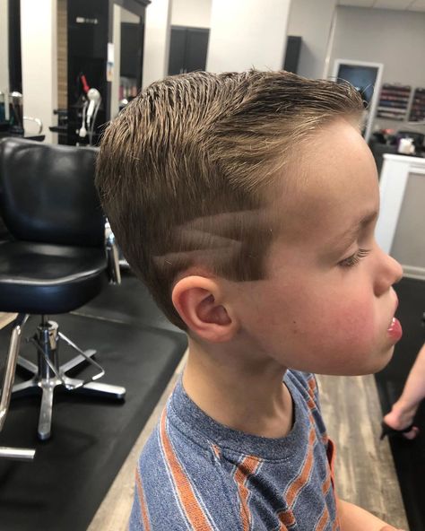 First buzz haircut with a thunder bolt design on the side by @hairbylynnr ✨ . . . . . . . . . . . #HillsboroughSalon #HillsboroughStylist… Boys Hair Cut With Lightening Bolts, Lighting Bolt Hair Design Boys, Boys Haircut Lightning Bolt, Lightening Bolt Hair Design Boys, Lightning Bolt Hair Design For Boys, Boys Haircut With Design On Side, Hair Designs For Boys, Boys Haircuts With Designs, Buzz Haircut