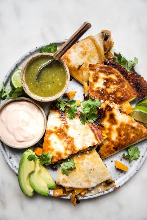 Squash season is upon us, and we’re ready to fall into flavor with these quesadillas filled with sweet and nutty butternut squash, caramelized onions and black beans. Chipotle Crema, The Modern Proper, Modern Proper, Quesadilla Recipes, Caramelized Onion, Favorite Appetizers, Roasted Butternut Squash, Winter Squash, Quesadillas