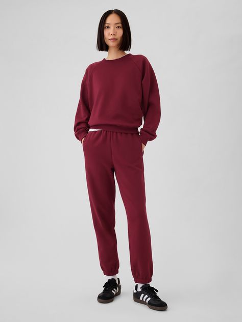 Soft cotton-blend joggers.  Elasticized waist.  Front slant pockets.  Elasticized leg openings.  Easy through the hip and thigh.  Skinny leg opening.  Hits at the ankle.  Models wearing Gap Burgundy Joggers Outfit, Sweats Set, Jumper Short, Cuffed Joggers, Vintage Soft, Red High, Red Vintage, Dyeing Process, Jogger Sweatpants