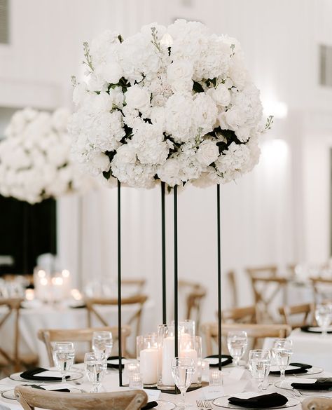 Black And White Tall Centerpieces, White Wedding Flowers Centerpieces Tall, Simple Modern Wedding Centerpieces, Tall White Floral Centerpieces Wedding, Big Wedding Centerpieces, All White Centerpieces Wedding, Tall Wedding Centerpieces Elegant, White Centerpiece Wedding, Tall Centerpiece Wedding