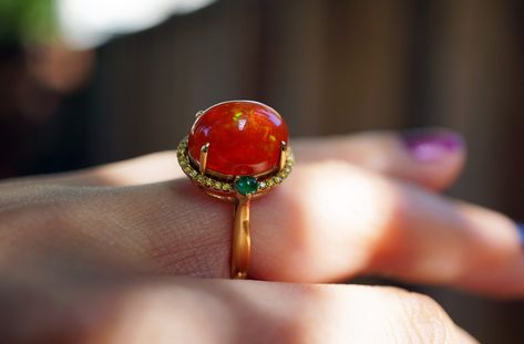 Gem: Mexican Fire Opal 18K gold: 5.2g (Au750 stamped) Opal weight: 6.257ct (stamped) Yellow Diamond: 0.176ct (Genuine) stamped Jade: 0.214ct(stamped) Ring size: US6 Treatments: every set stone are natural Color: as shown, dive into the depths of opal--a kaleidoscope of opalescent color that dances in the light Clarity: transparent, precious fire opal, excellent quality Come with Ring box ready for gifting or keepping We look forward to the opportunity of serving you！ Ring Yellow Diamond, Mexican Fire Opal Ring, Garnet Bead Bracelet, Yellow Diamond Ring, Stamped Ring, Mexican Fire Opal, Yellow Diamond Rings, Stamped Rings, Fire Opal Ring