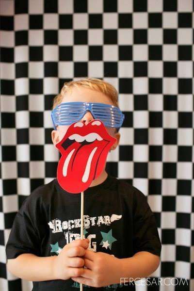 Gustavo's 2 years old Rock Party | CatchMyParty.com 40 Rocks Birthday, Rock And Roll Party Ideas For Adults, Rock And Roll Party Backdrop, One Rocks Backdrop, 70s Rock Theme Party, Rock Party Backdrop, Rock N Roll Backdrop, Rock Star Party Ideas, Rock And Roll Birthday Theme