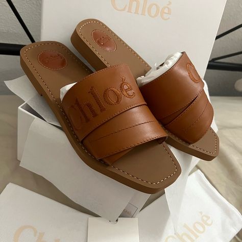 Brand New In Box With 2 Chloe Dust Bags And Cards. Chloe Brown Genuine Leather Woody Logo Sandals. These Are Original Over $650+!! These Are Leather Not The Cheaper Cloth Ones So These Will Last A Long Time. Do Not Send Any Lowballs It Is Ok To Buy Elsewhere. Gorgeous Chloe Logo Front And Center These Go With Literally Any Outfit!! Chloe Woody Sandals, Ribbon Sandals, White Slides Sandals, Dior Sandals, Chloe Logo, Chloe Sandals, Womens Footwear, Chloe Brown, Chloe Shoes