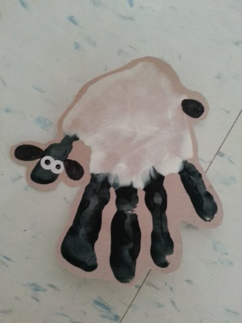 Handprint Sheep! Handprint Sheep Craft, Lamb Handprint Craft, Fingerprint Sheep Craft, Cow Handprint Art, Farm Handprint Art, Sheep Art Preschool, Farm Animal Handprint Art, Cow Handprint Craft, Sheep Footprint