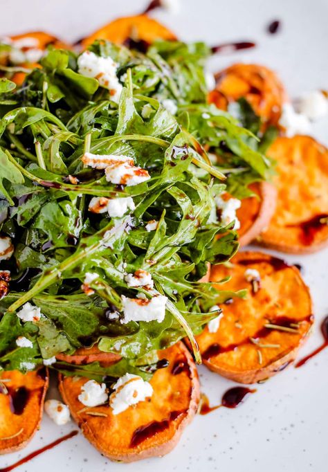 This easy, healthy Arugula Salad with Goat Cheese and Roasted Sweet Potato is perfect for Fall or Summer - any time of year of the year recipe! A simple balsamic glaze dressing adds a nice sweetness to the peppery arugula. Healthy Fall Sweet Potato Recipes, Kale Sweet Potato Goat Cheese Salad, Sweet Potato Goat Cheese Salad, Arugula Sweet Potato Salad, Sweet Potato Arugula Salad, Arugula Chickpea Salad Recipes, Recipe With Arugula, Kale Arugula Salad, Recipes Using Arugula