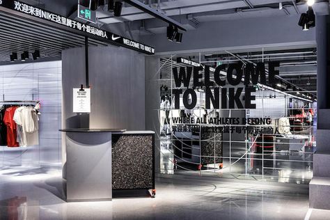 The new Nike Rise concept store opens in Guangzhou features personalised shopping services with a focus on digital experiences. See more at Inside Retail Asia. #NikeRise Nike Retail Store Design, Nike Concept Store, Nike Store Interior, Nike Store Design, Nike Exhibition, Modern Reception Counter, Nike Retail, Reception Desk Counter, Shoe Store Design