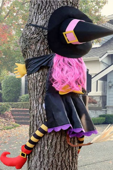 This next eye-catching Halloween party decoration will make everyone laugh out loud! How bat crazy is this witch crashing into a tree or even your front door? Kids, especially, are gonna love it! See more party ideas and share yours at CatchMyparty.com Flying Witch Outdoor Decoration, Crashing Witch Door Decoration, Witch Crashing Into Tree Diy, Diy Witch Crashing Into Tree, Witch Halloween Decorations, Witch Broom Parking, Crashing Witch, Witch Broom Parking Sign, Outdoor Halloween Party Decorations