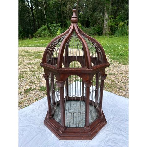 Bird cages are charming accessories and display house plants so nicely. This one could possibly function as a real bird cage. The octagonal shape peaks gracefully at the top. The base is stacked and the sides resemble columns. The bottom tray is metal framed in wood and slides out for cleaning. The door is on a spring and works. Please note! We cannot attest to this cage being completely safe for a bird. Please do your own research. We only used food grade butcher block oil for cleaning the fram Ornate Bird Cage, Cage Decoration Ideas, Bird Cage Wedding Decor, Display House Plants, Drawtober 2024, Victorian Bird Cage, Vintage Terrarium, Wooden Bird Cage, Moody Bohemian