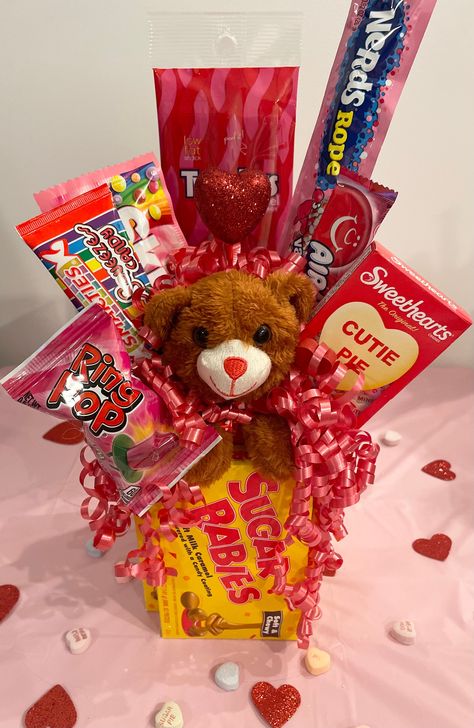 Nothing says I love you like a sweet Sugar Babies Candy Bouquet! This candy bouquet comes with four full size boxes of Sugar Babies candies and stuffed with an assortment of candy including Ring Pops, Smarties Candy Squeeze Tube, Sweethearts Candy and more! These are made to order and please allow adequate time for shipping. (*Teddy Bear Included) Valentines Day Candy Bouquet, Sweethearts Candy, Bouquet Valentines Day, Smarties Candy, Bouquet Valentines, Valentines Day Candy, Sweetheart Candy, Bouquet Small, Ring Pops