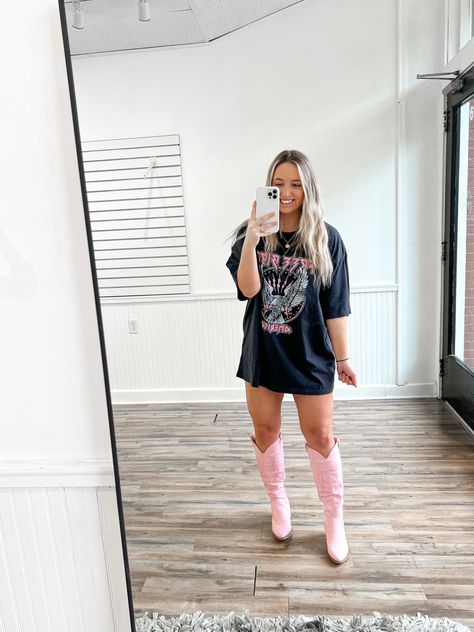 Oversized Graphic Tee & Pink Cowgirl Boots 💖 Oversized Shirt With Cowboy Boots, Oversized Tshirt Cowgirl Boots, Tshirt Dress Cowboy Boots Outfit, Light Pink Cowboy Boots Outfit, Oversized Tshirt With Cowboy Boots, Festival Cowboy Boots, Pink Western Boots Outfit, Tshirt Dress With Boots, Pink Cowgirl Boots Outfit