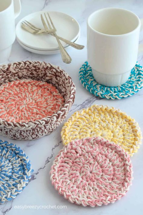 Round Double Crochet Coaster Pattern And Basket | Easy Breezy Crochet Crochet Coaster Set Free Pattern, Crochet Cup Coaster, Crocheted Coasters, Kitchen Crochet, Crochet Scrubbies, Crochet Coasters Free Pattern, Crochet Bowl, Coaster Pattern, Crochet Placemats